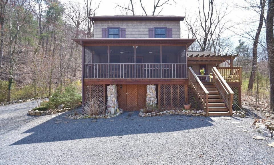 Screened porch & deck facing the river