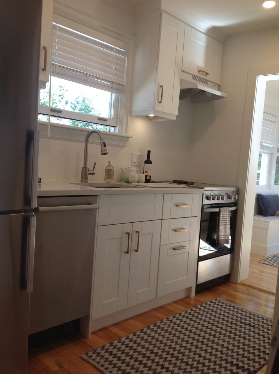 Galley kitchen with Breville machine + local coffee
