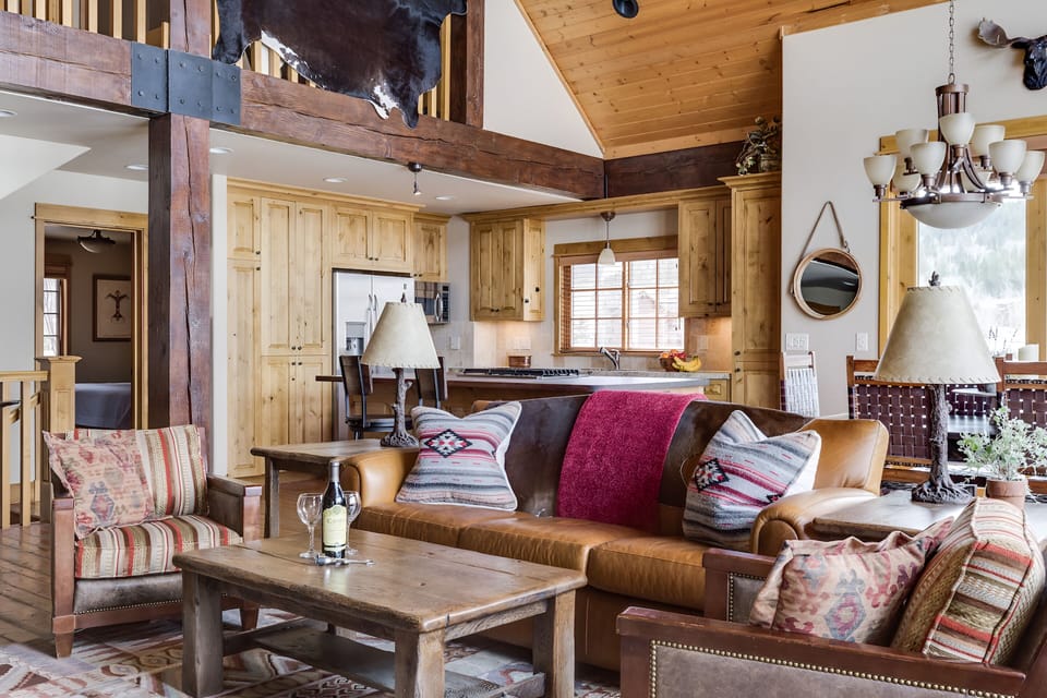 Gather by the warm lodge-style living area for evenings in.