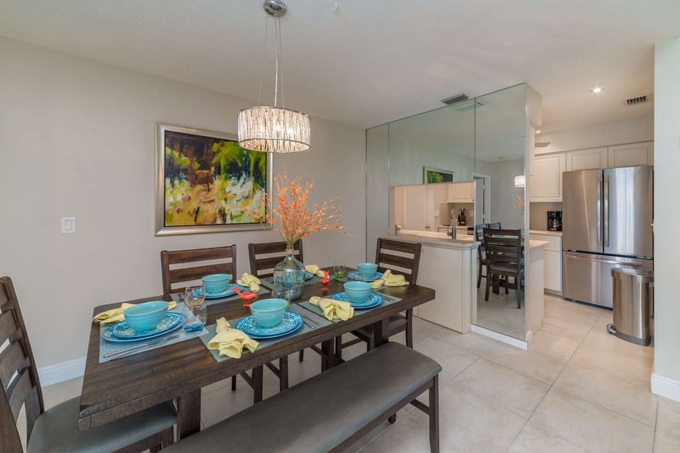The six person dining room table is a great place to watch the aspiring chefs in the family whip up the latest culinary delight.