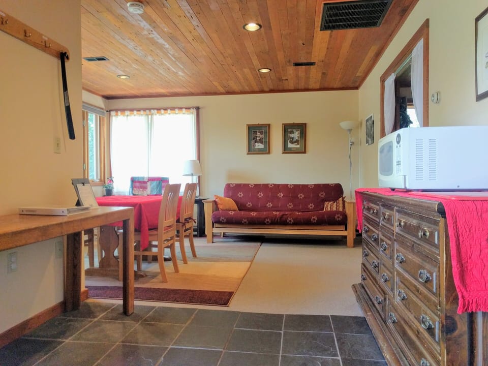 Guest House and local information in guest book on entry table.