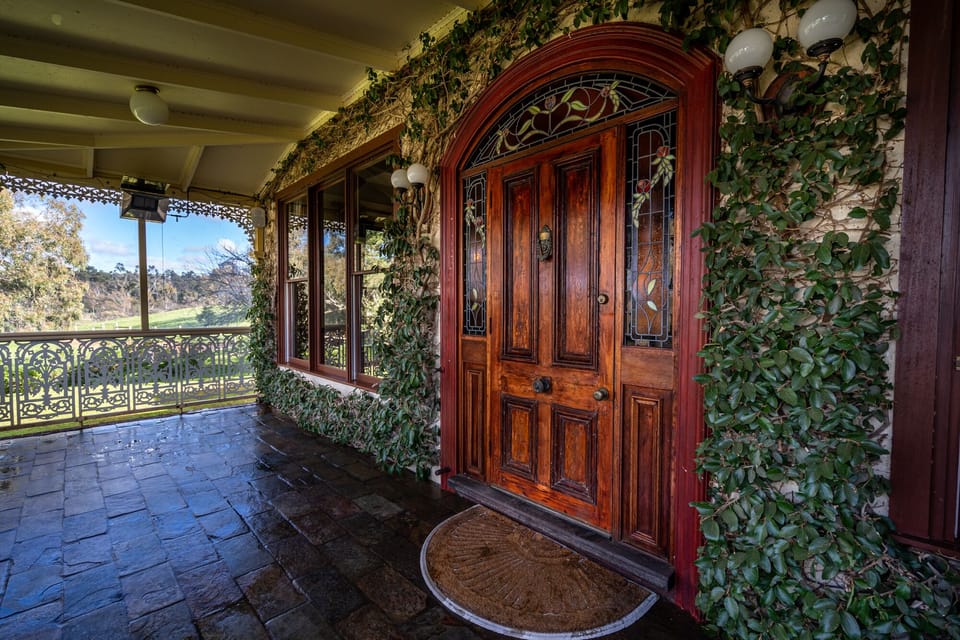 The entrance on front veranda. Table and chairs provided to sit outside.