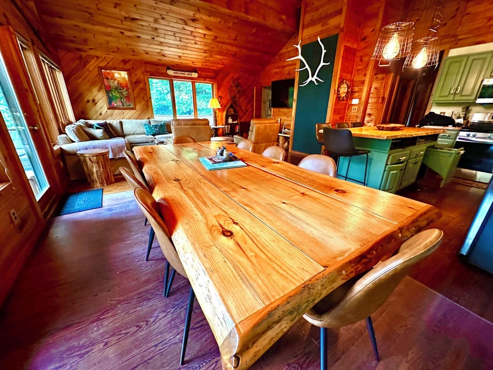 Beautiful custom ADK dining table that easily seats 8. Island seats 4.