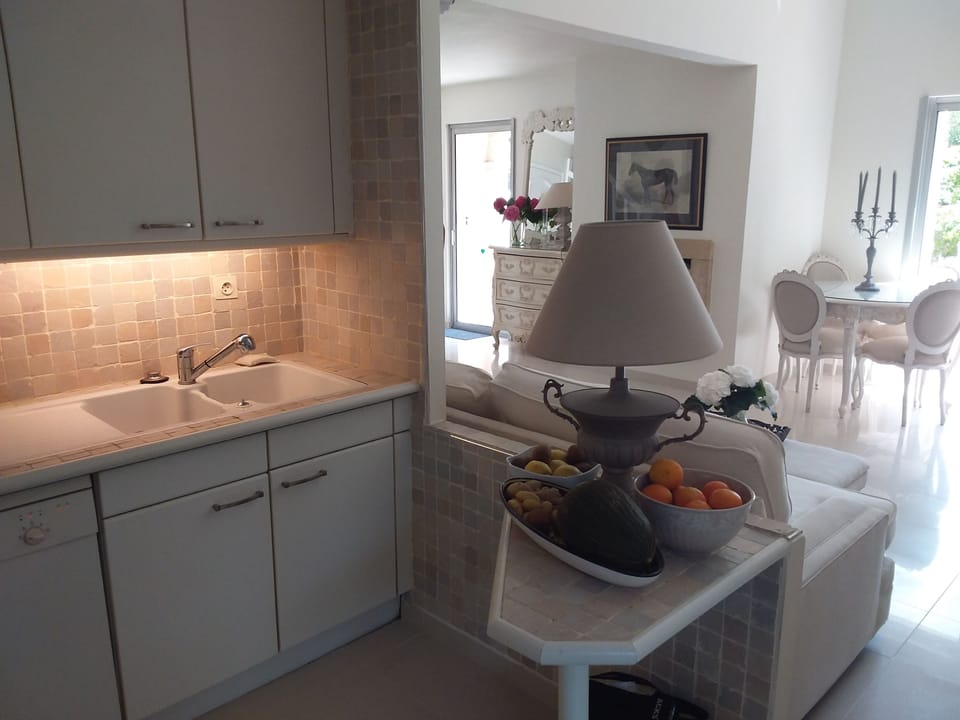 Kitchen leading to living room.