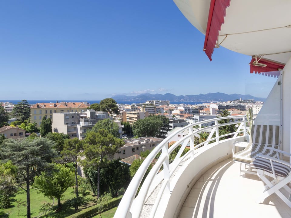 Furnished terrace with unobstructed views of the hills and sea, awning.