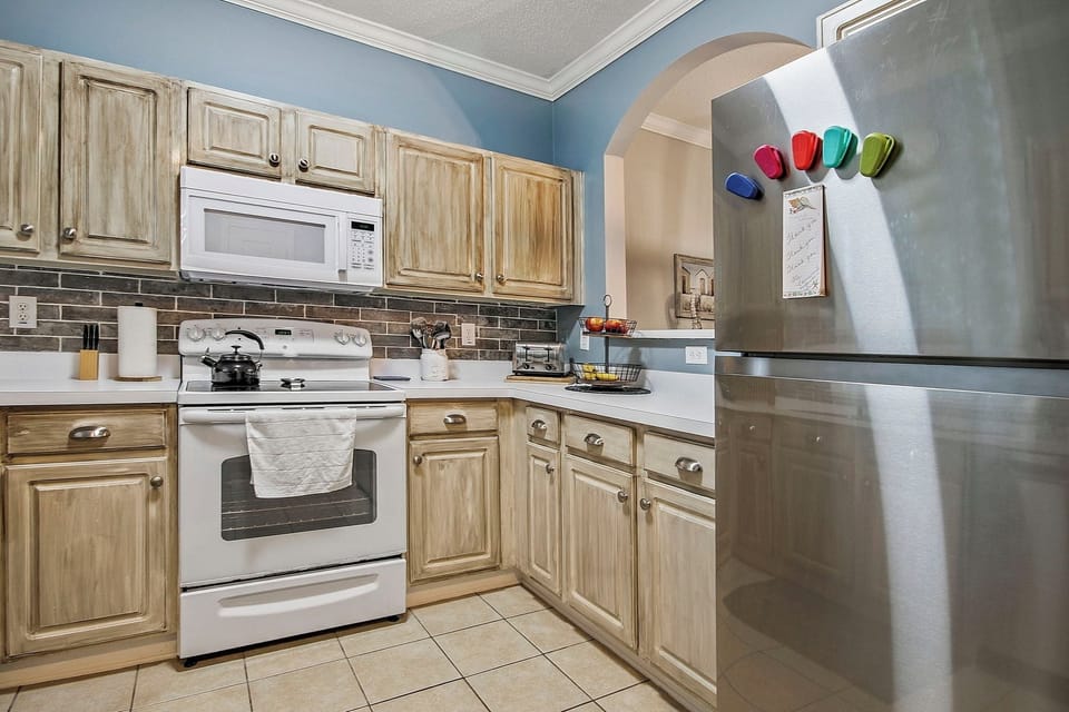 Fully stocked kitchen- new stainless refrigerator and dishwasher