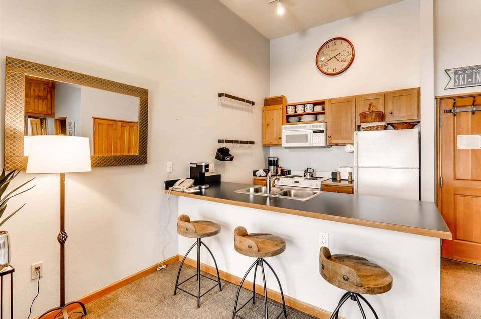 Gold-rated kitchen within a one bedroom with murphy in River Run Village