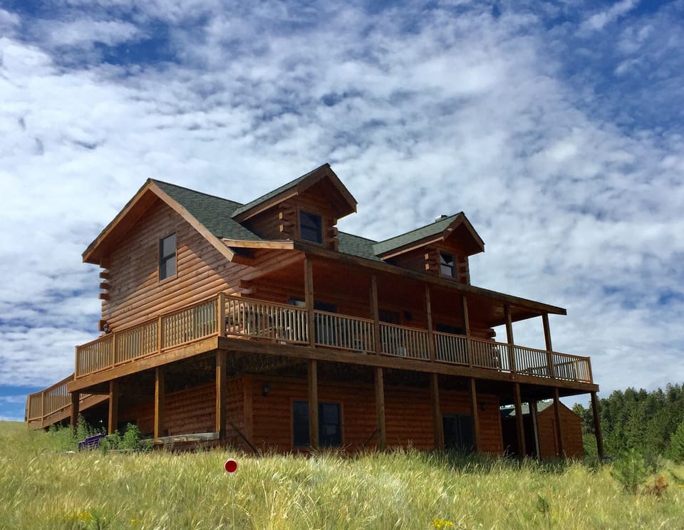 Paul's cabin is set atop a hill to offer unrivaled views of the mountains. 