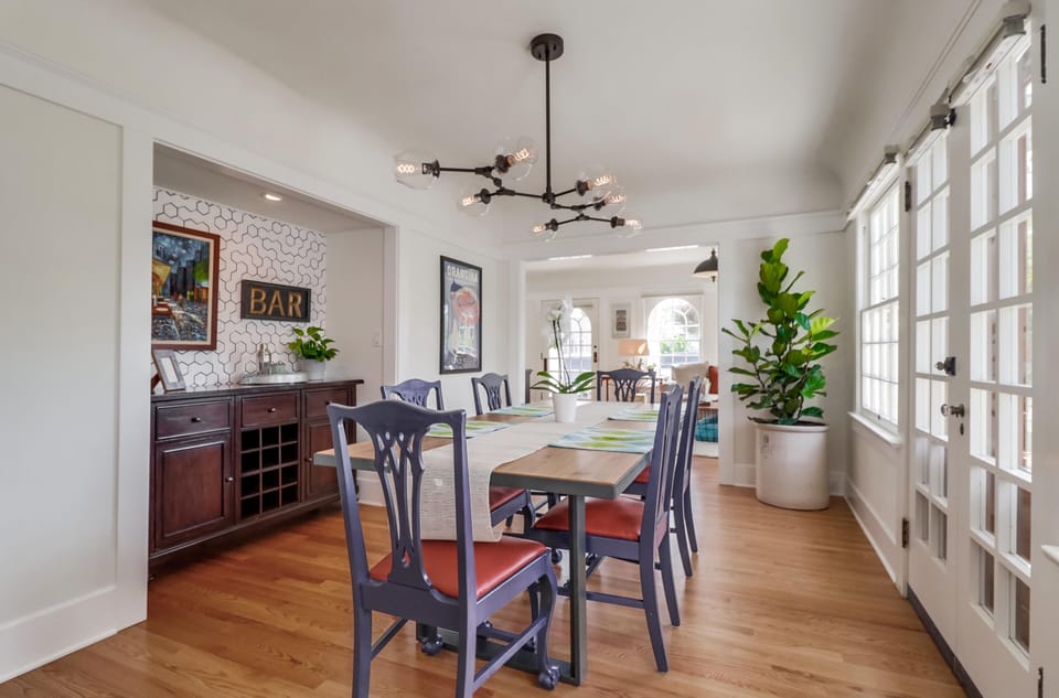 Dining Room with sideboard for entertaining and open to living room. 