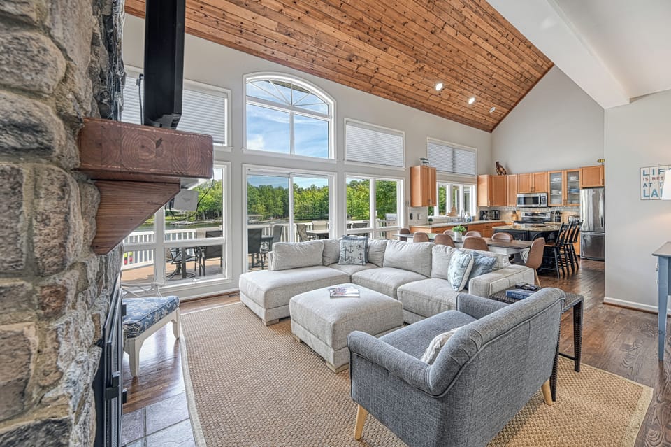 Main level - Great room. Ample seating. Sectional sofa, loveseat & chair.