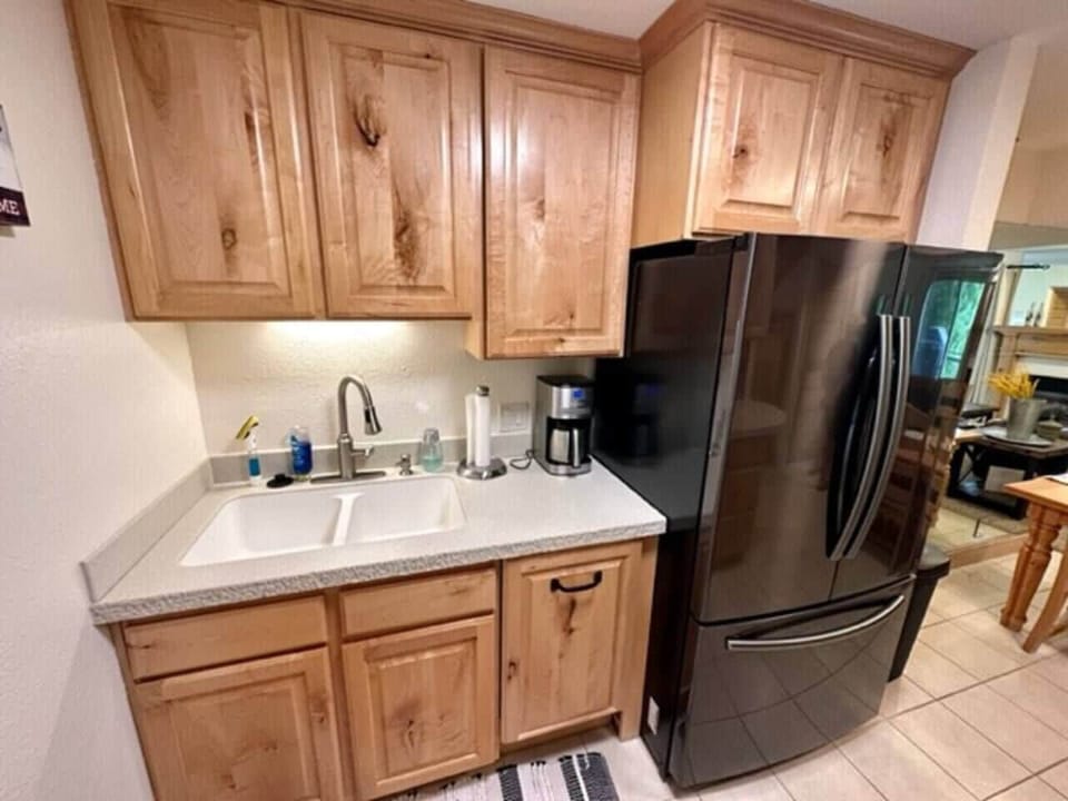 There's a coffee maker, dishwasher, toaster, iron, hair dryer, fire extinguisher, smoke detectors, carbon monoxide detectors.