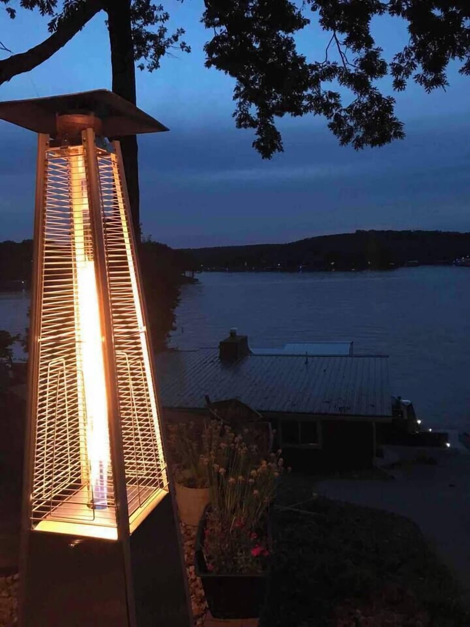 Outdoor propane fire heater in stylish flame glass tube for those chilly nights.

