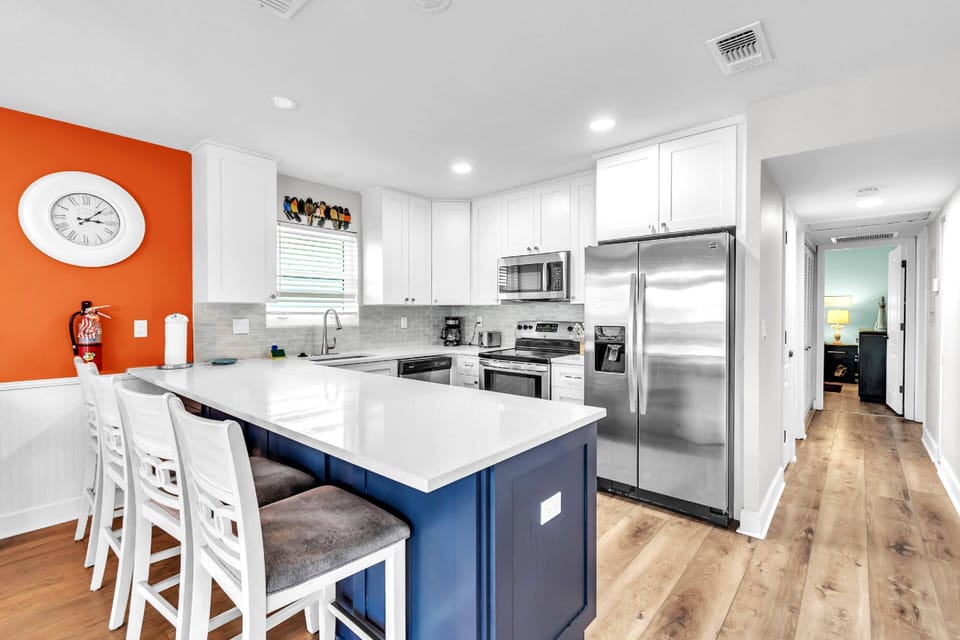 Updated Kitchen with Quartz Countertops and Stainless-Steel Appliances