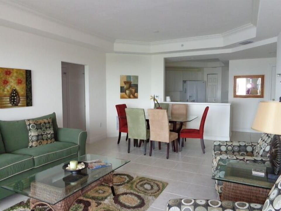 Living room continuous with dining room