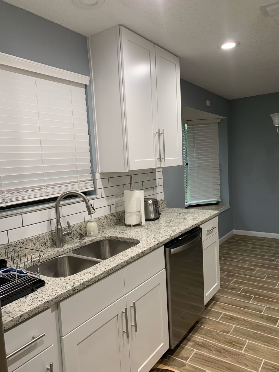 Stainless steel double sink and granite counter top