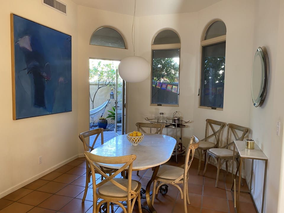 Dining table perfect for 6 with view of French garden