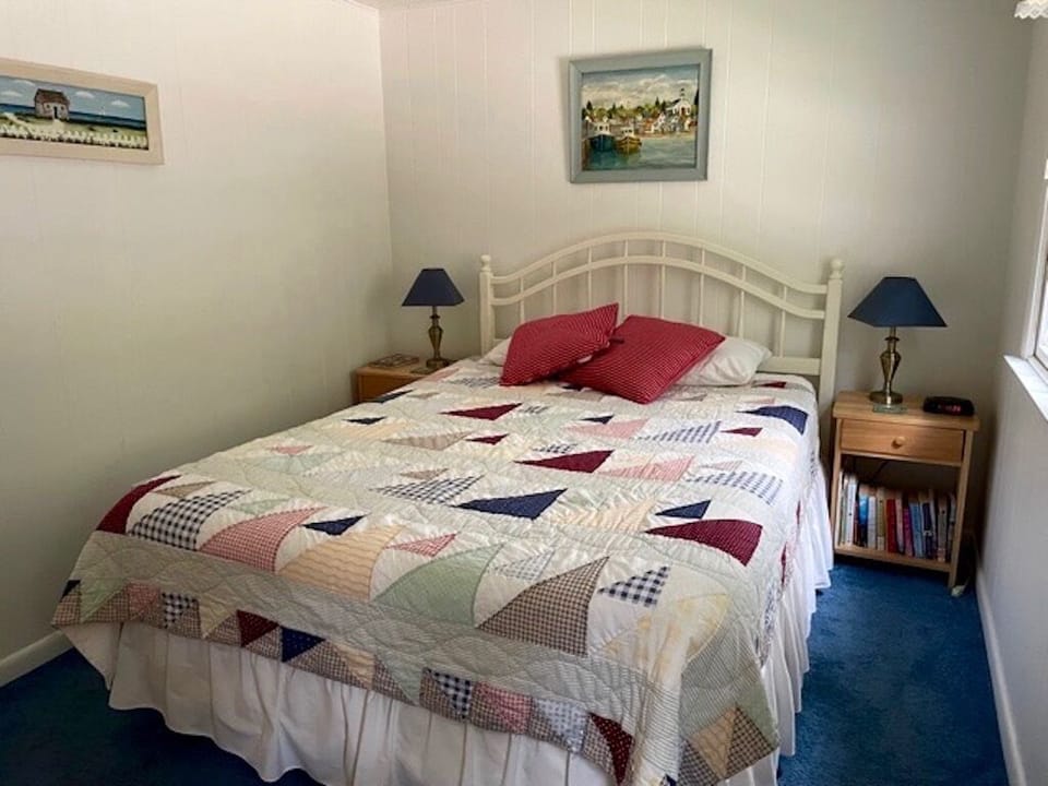 Separate bedroom with queen bed