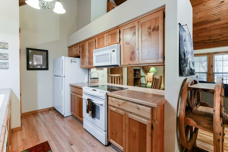 The kitchen has full-sized appliances and lots of counter space.