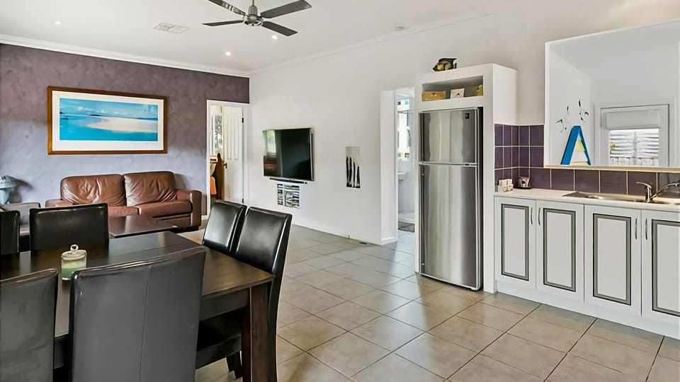 Open plan living, dining and kitchen.