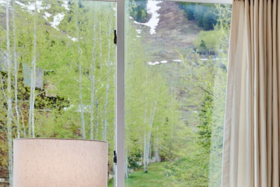 The windows in the living area offer nice views of the ski trails on Aspen Mountain, just steps from your condo.