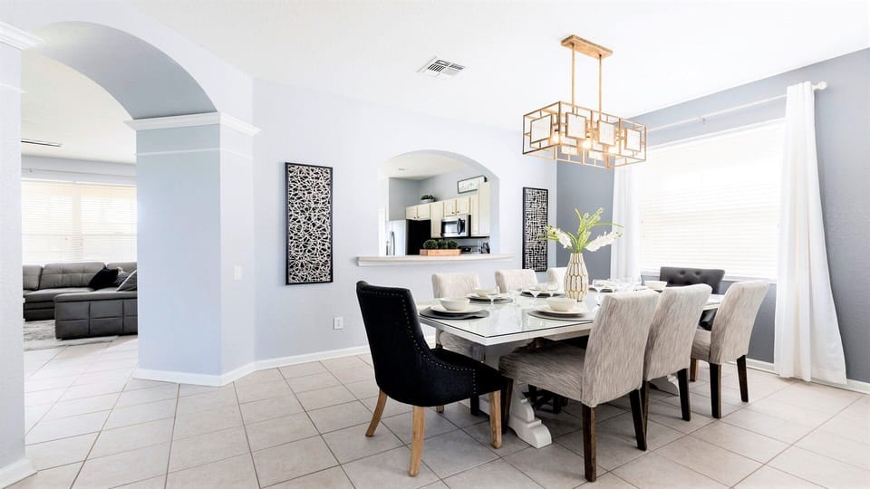 Elegant dining space with modern decor, perfect for gatherings and cozy meals!