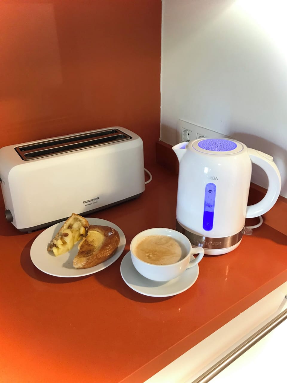 Cafe con leche and local cakes. 