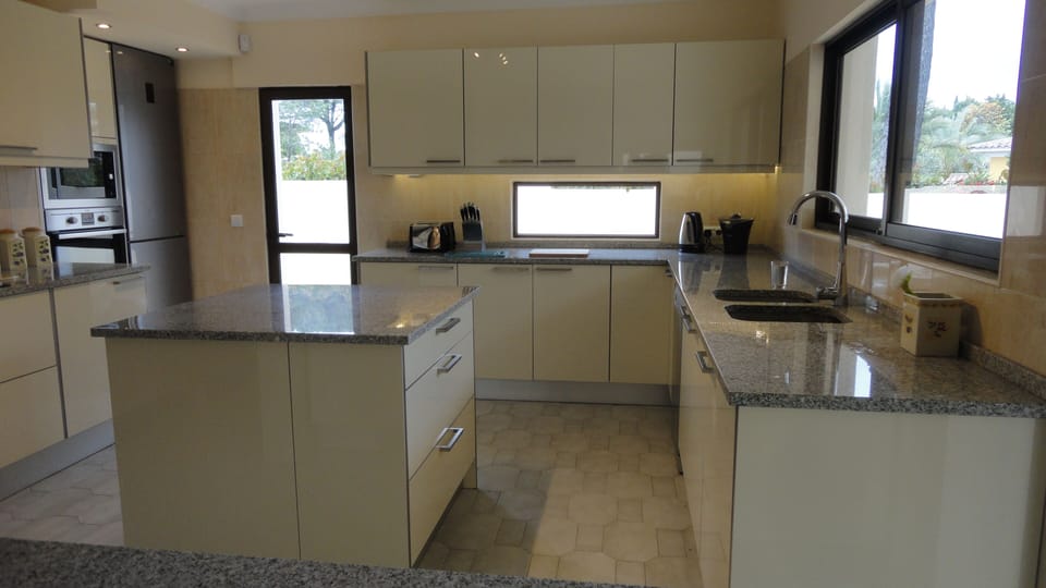 Our new kitchen,lovely views over the garden and golf course