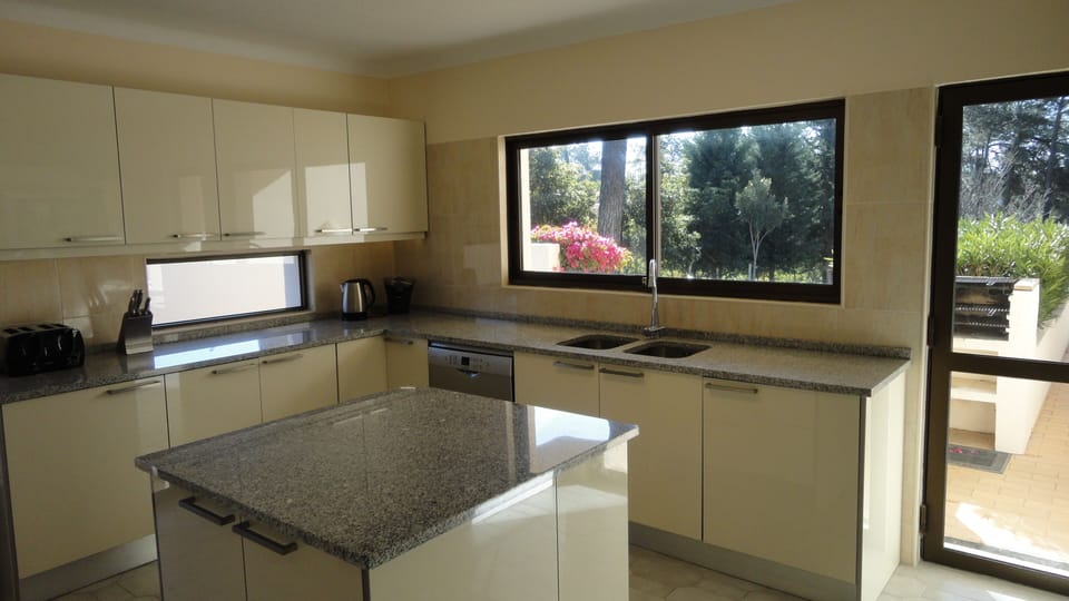 kitchen with doorway to the garen