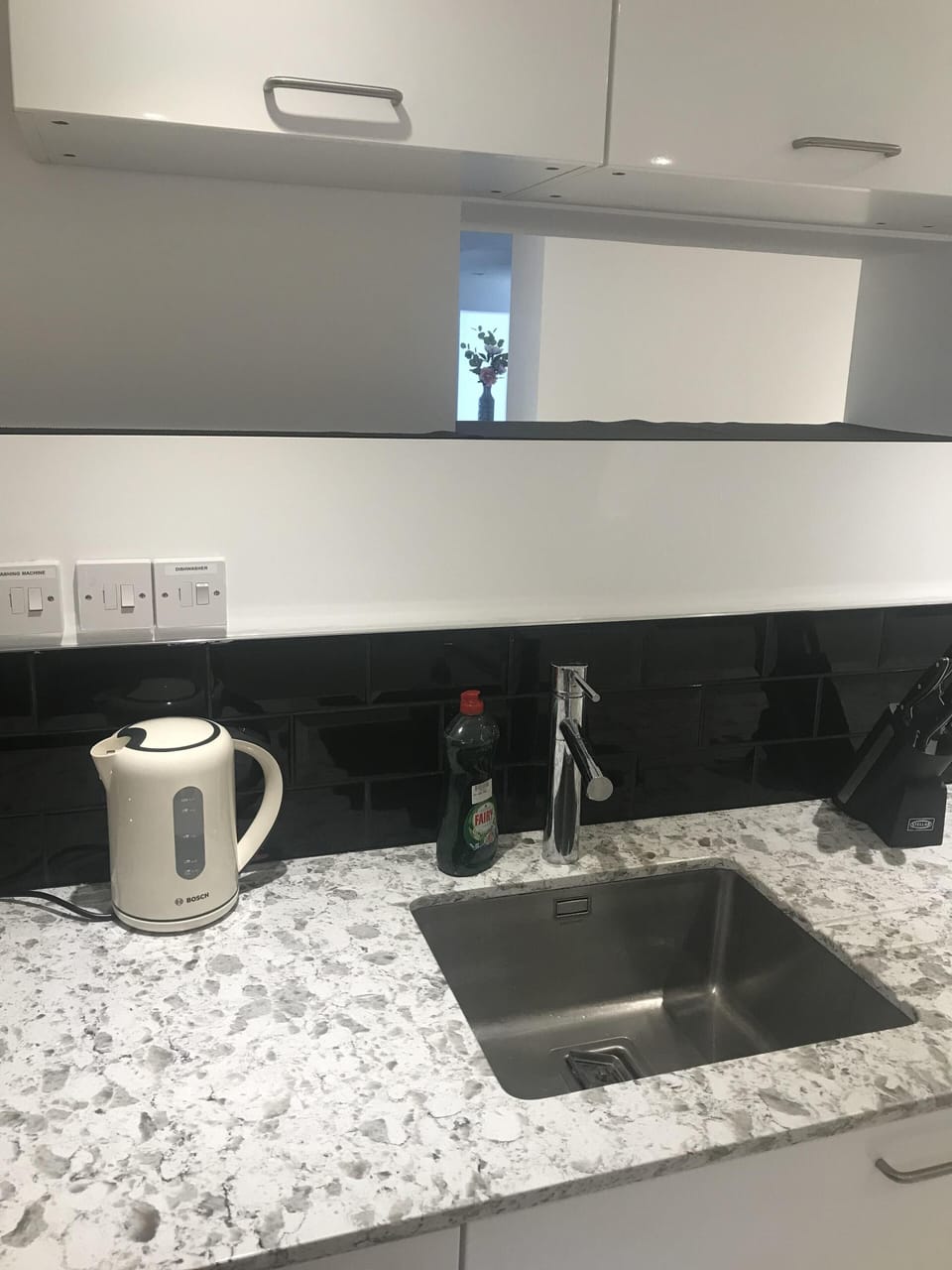 contemporary kitchen with marble worktop