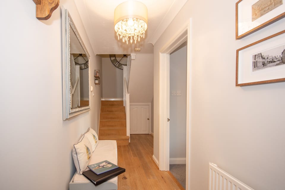 Hallway with luxury lighting and lots storage