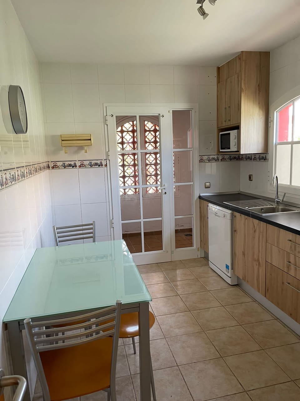 Kitchen View to Utility Room