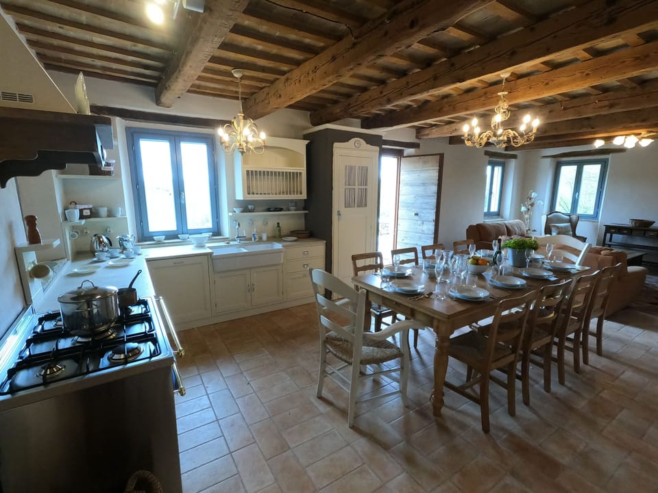 Kitchen and dining/living room in the large apartment (first floor)