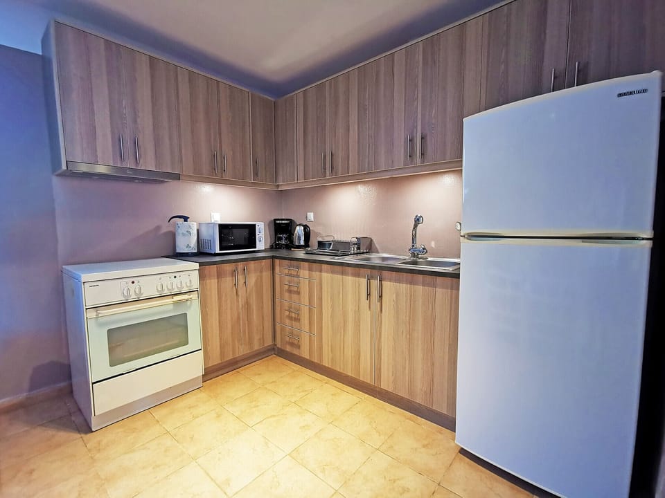 Open-plan fully equipped kitchen