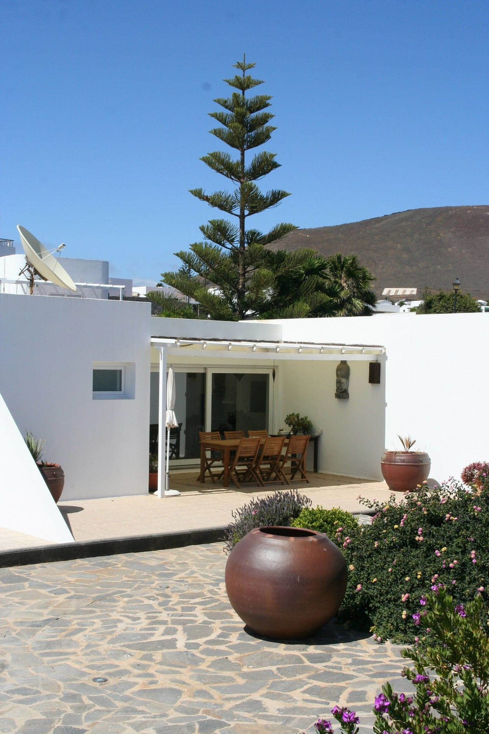 Covered outdoor dining space with IR heater