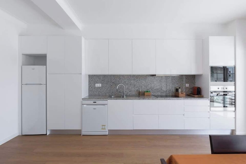 The kitchen is equipped with fridge, stove, oven, microwave, dishwasher, coffee machine, exhaust fume and utensils.