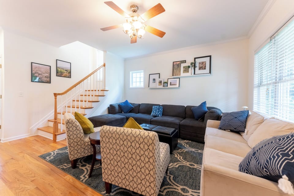 This is the spacious living room that comfortably seats 10+ people.