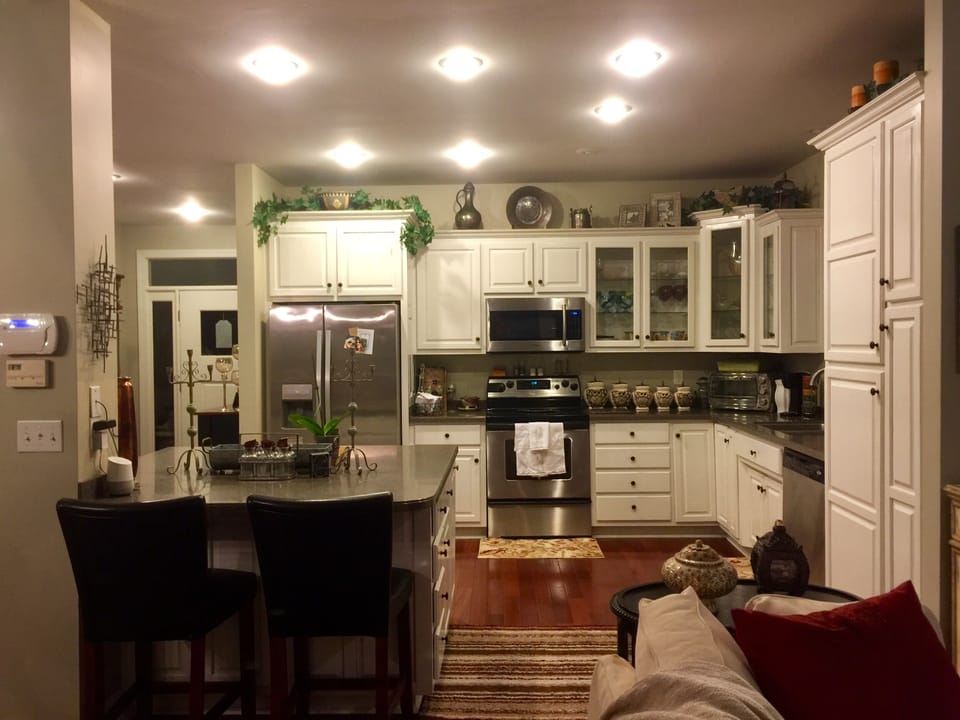Fully stocked kitchen with full view of lake.