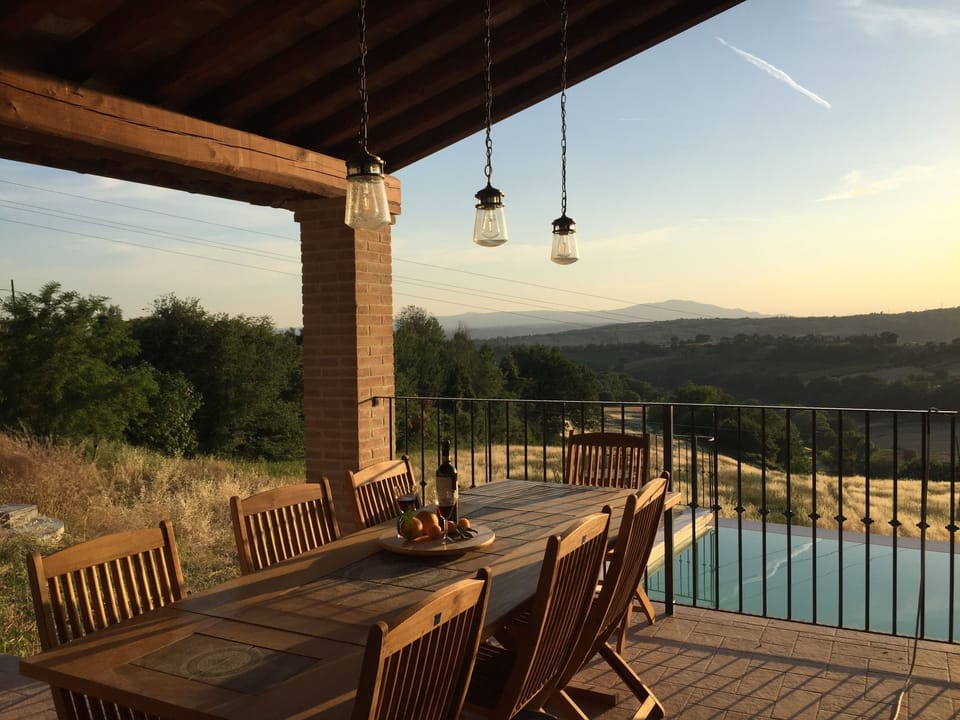 patio pool and valley at sunset