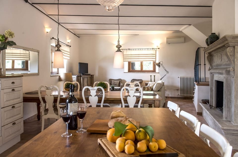 view from downstairs kitchen area towards the dining table and tv area