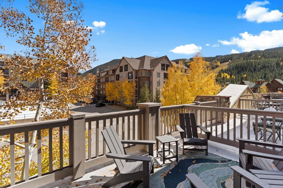 Step onto your private balcony and soak in stunning autumn views of golden aspens and mountain peaks beyond.