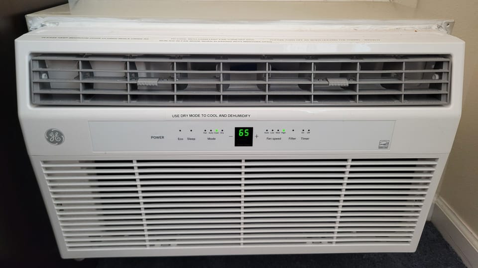 12,000 BTU GE Wall Air Conditioner in Bedroom