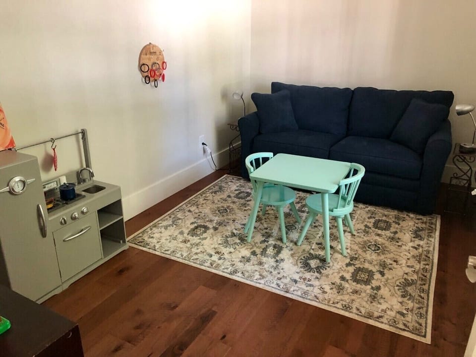 Toy room with full size sleeper sofa
