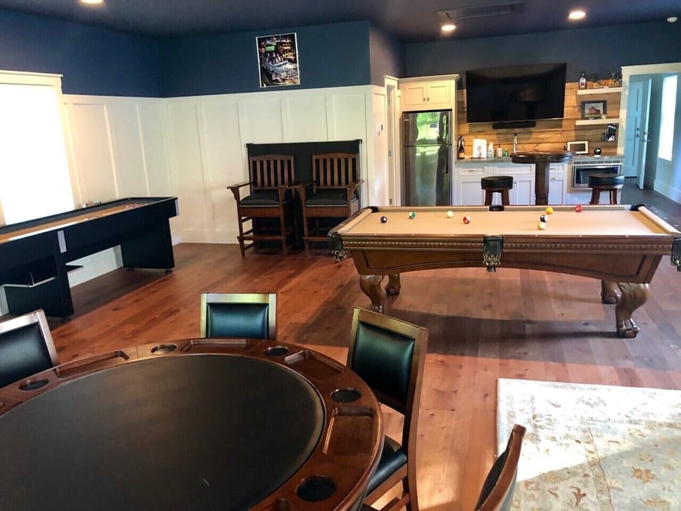 Activity room with refrigerator and full bathroom