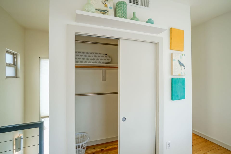 Large closet w/ iron&board