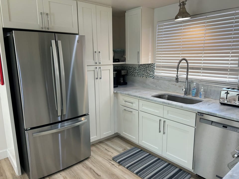 Fully equipped kitchen with large frig w/drip and Keurig coffee station