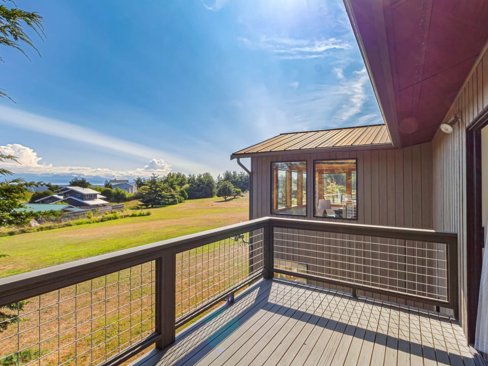 Primary bedroom deck with water view