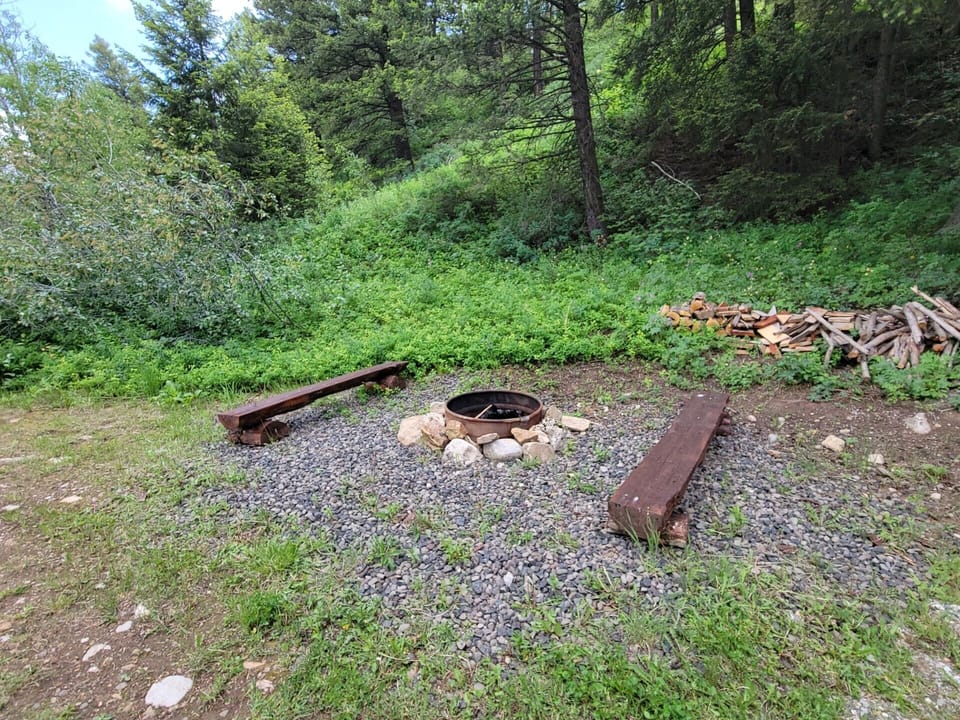 Firepit shared with one other "treehouse" cabin.