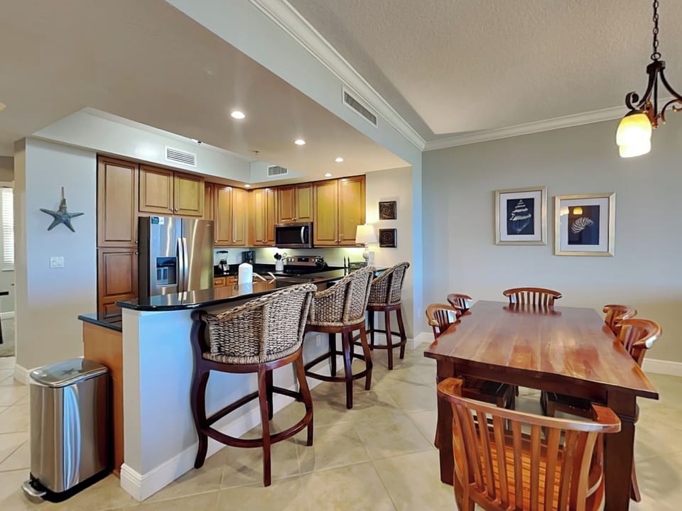 Dining Area and Kitchen with Bar Seating for Three