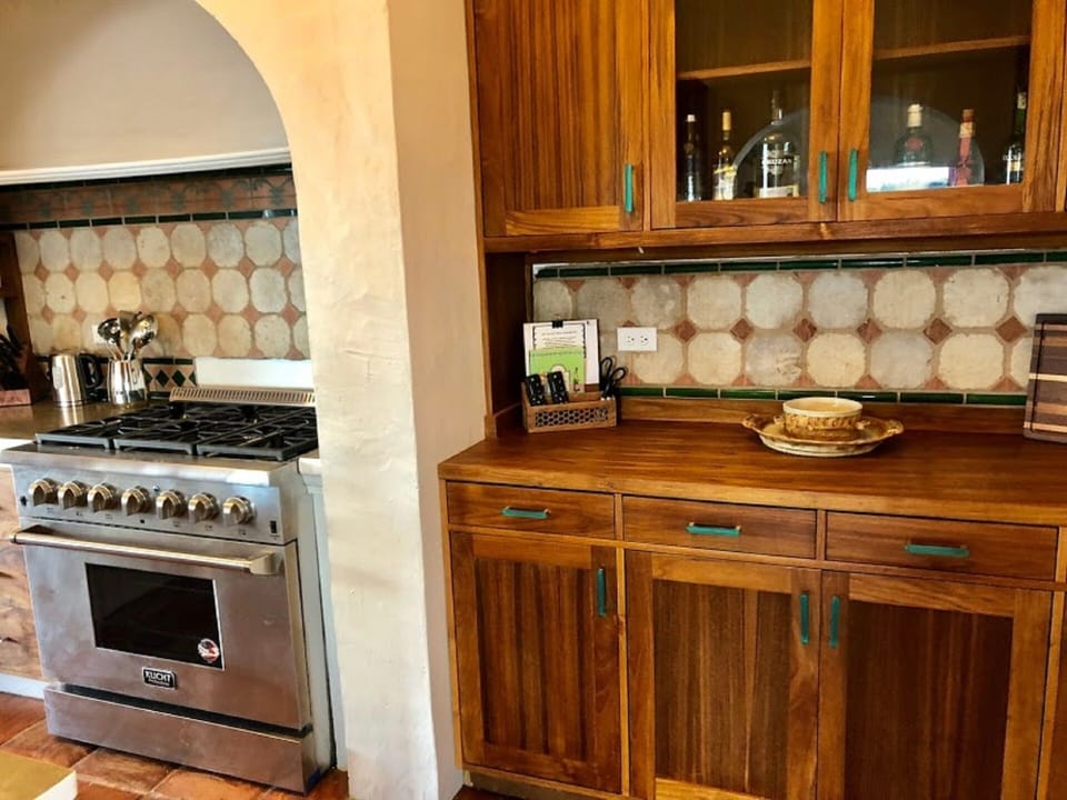 Fully equipped kitchen with commercial propane stove and oven