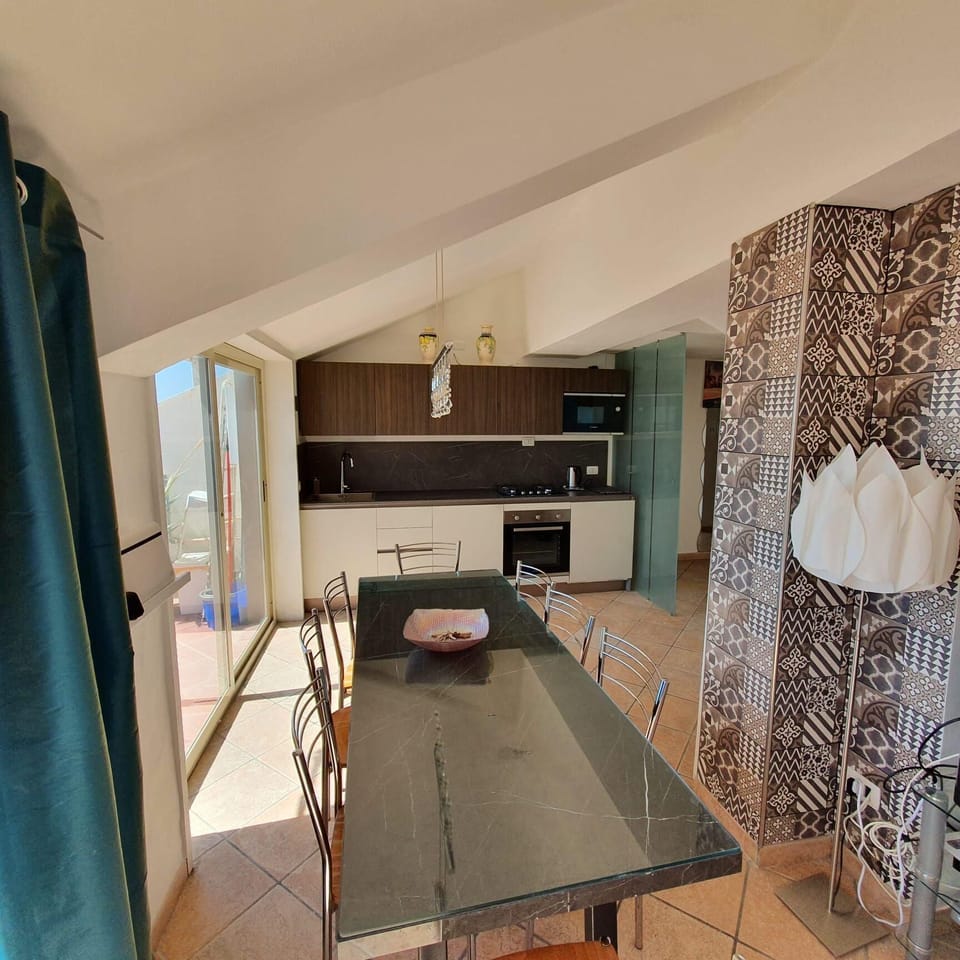 Dining area. New kitchen with oven, microwave, dishwasher (2022)